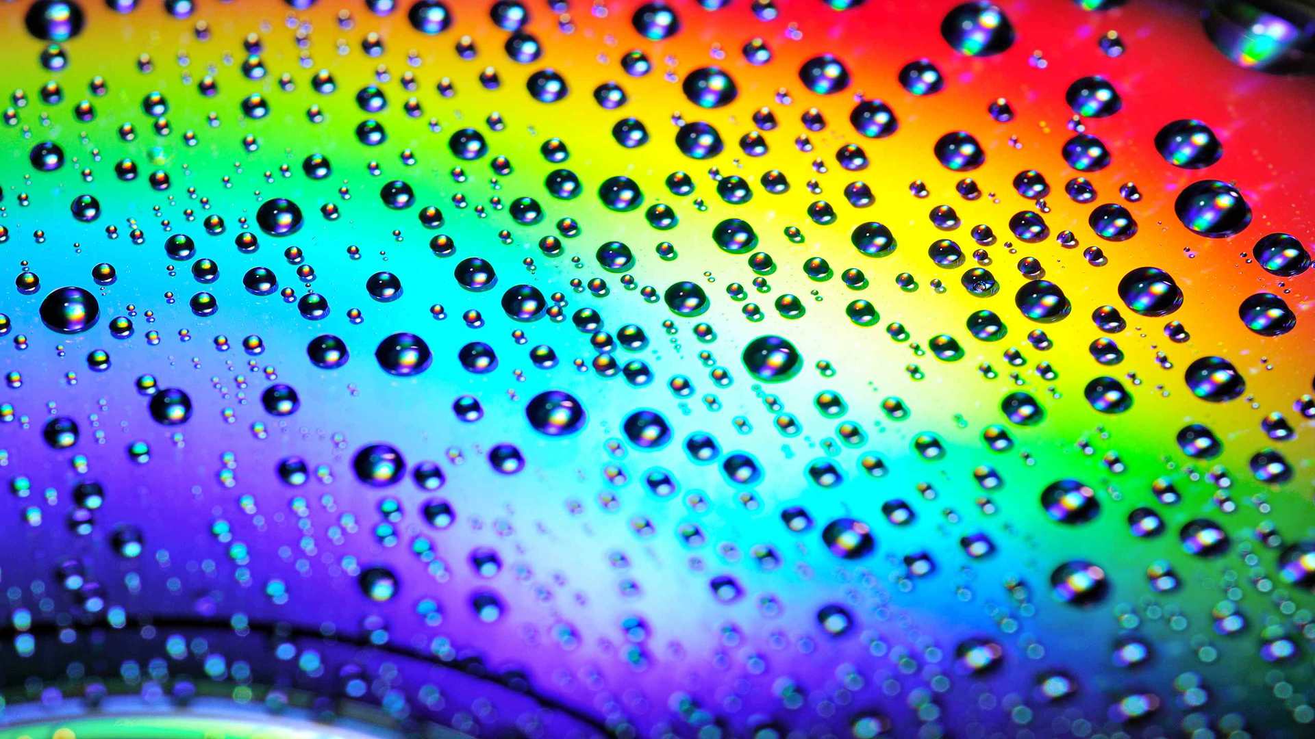 01845_waterdropsontherainbow_2560x1600 — dynamic wallpaper